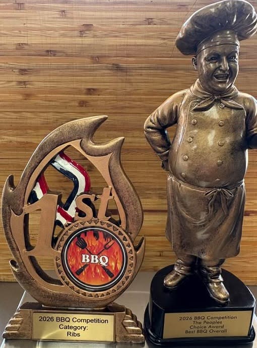Arthur Gumirov, founder and pitmaster of BBQ Art Co., with the 2026 BBQ Competition trophies